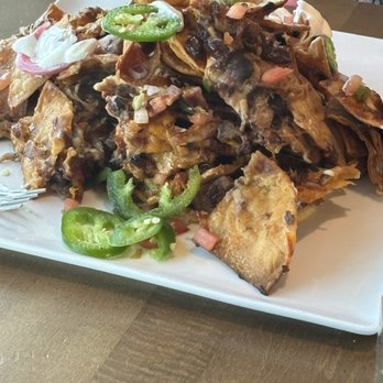 Guy Fieri's Flavortown Kitchen & Bar - Nachos supreme! - Bars Near Me - Newark, New Jersey Guy Fieri's Flavortown Kitchen & Bar - Nachos supreme! - Bars Near Me - Newark, New Jersey