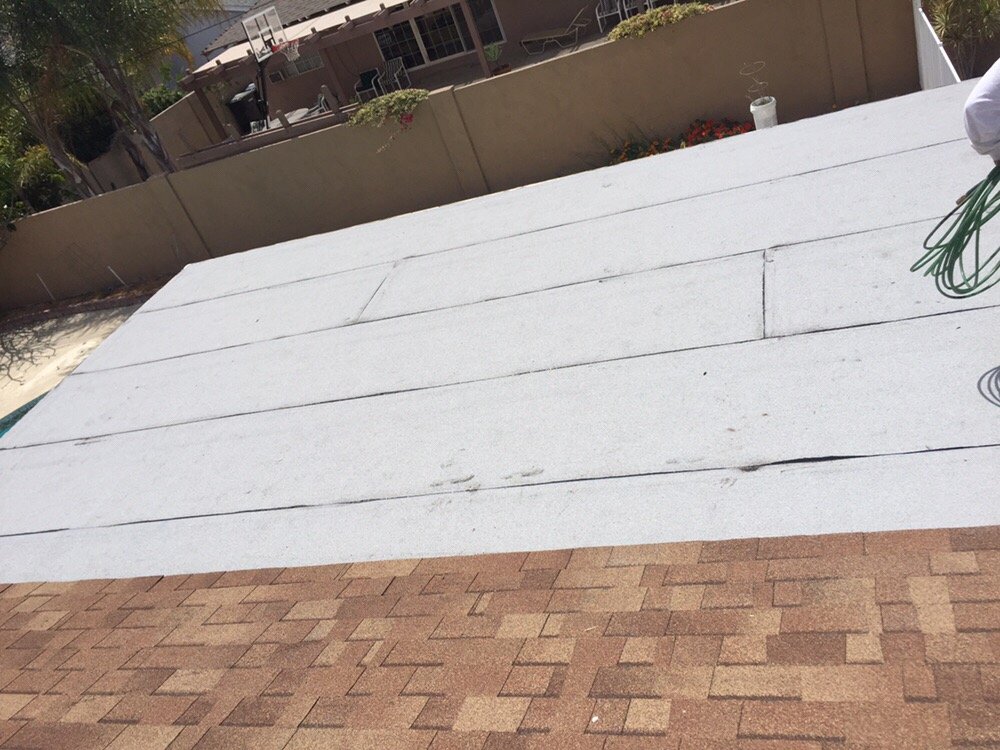 Slide of E & E Roofing