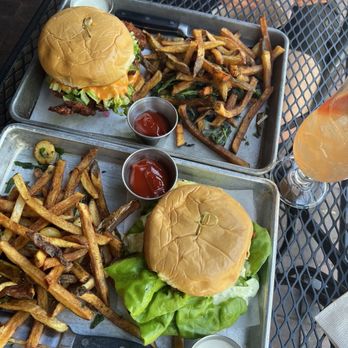 The Black Duck Cask and Bottle - Fried Chicken Sandwich top and Crispy Fish Sandwich bottom - Pizza Near Me - Issaquah, Washington The Black Duck Cask and Bottle - Fried Chicken Sandwich top and Crispy Fish Sandwich bottom - Pizza Near Me - Issaquah, Washington