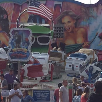 Del Mar Fairgrounds - Don't mind the strange paintings behind your kids on the ride. - Stadiums & Arenas Near Me - Del Mar, California