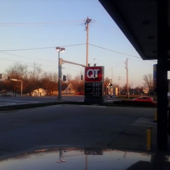 QuikTrip - the reflection of a gas station sign - Convenience Stores Near Me - St Peters, Missouri