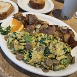 Sausage, avocado, spinach scramble with home fries