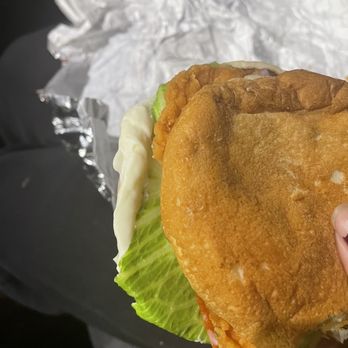 Wendy's - a hand holding a sandwich - Fast Food Near Me - Denver, Colorado Wendy's - a hand holding a sandwich - Fast Food Near Me - Denver, Colorado