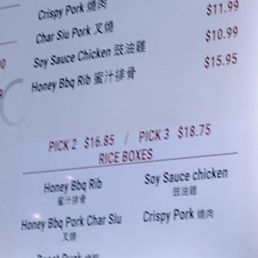 Close up of the rice boxes menu and the pick 2 and pick 3 options and prices