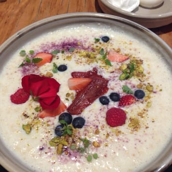 Top Paddock Cafe - Oat porridge with strawberry and rhubarb compote with lavender sugar and pistachios - Cafes Near Me - Richmond, VIC Top Paddock Cafe - Oat porridge with strawberry and rhubarb compote with lavender sugar and pistachios - Cafes Near Me - Richmond, VIC