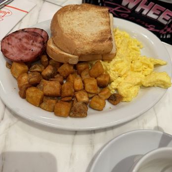 Junior's - 2 egg breakfast with country potatoes , toast and Canadian bacon - Breakfast & Brunch Near Me - Las Vegas, Nevada