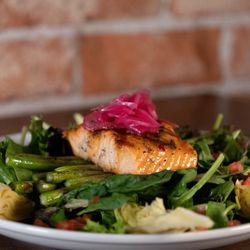 The Saddle - Salmon & Asparagus-Honey soy glazed 6 oz salmon, asparagus, baby greens, tomato, marinated red onion, artichoke hearts, citrus vinaigrette