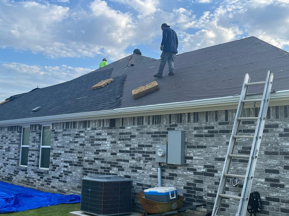 Slide of ER Roofing & Reconstruction