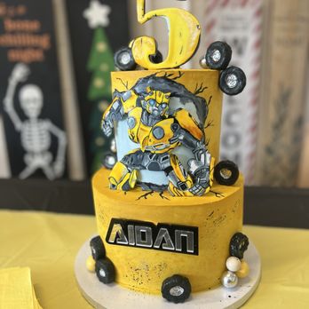 Petite Moi Bakery - Chocolate cake, hand drawn transformer bumble bee! - Desserts Near Me