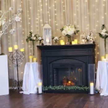 The Ruston Chapel - Front ceremony area with beautiful candles, lights, fireplace and flowers. - Venues & Event Spaces Near Me - Ruston, Washington The Ruston Chapel - Front ceremony area with beautiful candles, lights, fireplace and flowers. - Venues & Event Spaces Near Me - Ruston, Washington