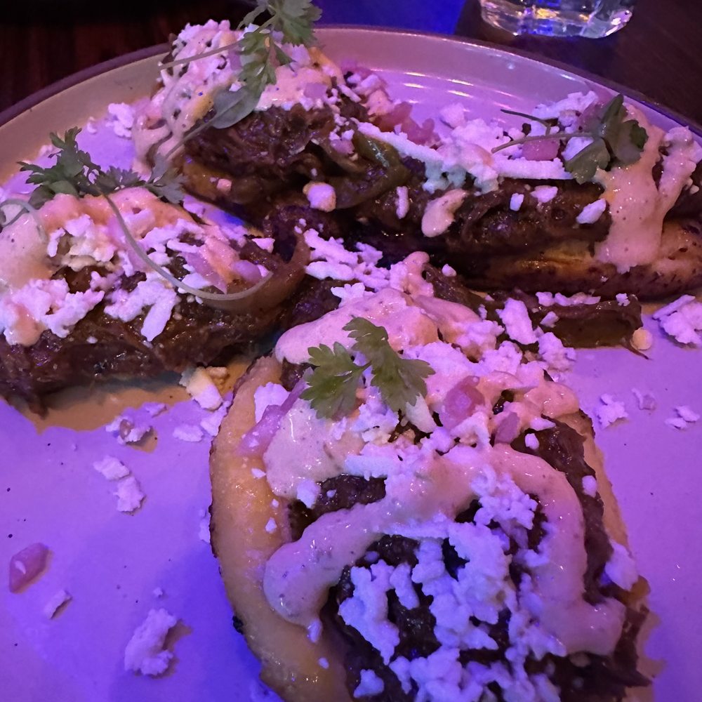 Dell Rooster - Ropa Pal' Viejo - Latin American Near Me - Chicago, Illinois