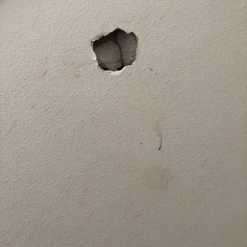 Rm Construction - Whole in wall on stairs - General Contractors Near Me - Silverdale, Washington