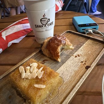 Sana'a Cafe - Pistachio latte, chocolate, croissant, and one of their sweet honey-drizzled Turkish pastry - Coffee Roasteries Near Me - Oakland, California