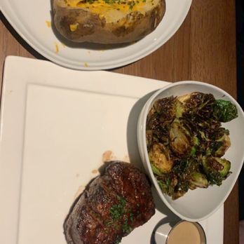 Prism - Loaded baked potato  Brussels - Seafood Near Me - Detroit, Michigan
