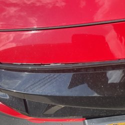 Quality Auto Body - Grill not clipped in. Clips broke.