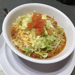 2 Veggie tamales with pinto beans, lettuce, tomatoes & cheese.
