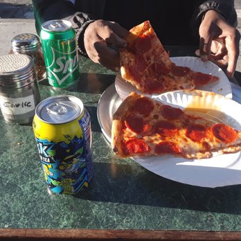 Lulu’s Pizza - a slice of pepperoni pizza and a can of soda - Pizza Near Me - Elmhurst, New York Lulu’s Pizza - a slice of pepperoni pizza and a can of soda - Pizza Near Me - Elmhurst, New York