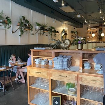 The Brass Pearl - Welcome desk, check in and get your table. - Live/Raw Food Near Me - Knoxville, Tennessee