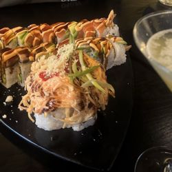Bruins roll, Dragon roll, volcano roll and ginger martini