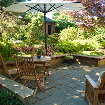 Greenspace Designs - The dappled shade of this patio makes for the perfect summer escape - Landscape Architects or Designers Near Me Greenspace Designs - The dappled shade of this patio makes for the perfect summer escape - Landscape Architects or Designers Near Me