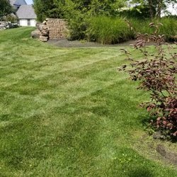 Kutmasters Lawn Care Services - The unique design of this yard along with the landscaping makes for a great day's work!!