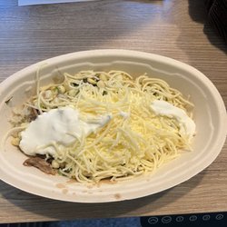 Chipotle Mexican Grill - Literally nothing, paid for cheese?! Where is the food cheap ass