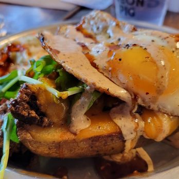 Neon Pig - a plate of food on a table - Butcher Near Me - Tupelo, Mississippi Neon Pig - a plate of food on a table - Butcher Near Me - Tupelo, Mississippi