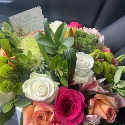 a bouquet of flowers in a car