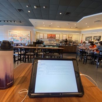 Starbucks - a tablet on a table in a coffee shop - Coffee & Tea Near Me - Houston, Texas Starbucks - a tablet on a table in a coffee shop - Coffee & Tea Near Me - Houston, Texas