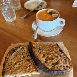 cup of Cream of Tomato Fennel Soup Grilled Cheese