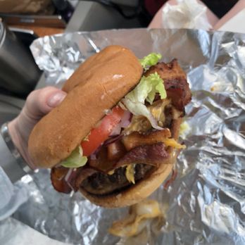 Delirious Burger - Seriously look at this massive thing. Single bacon cheese burger, added sautéed onions. - Canadian (New) Near Me - Hamilton, Ontario Delirious Burger - Seriously look at this massive thing. Single bacon cheese burger, added sautéed onions. - Canadian (New) Near Me - Hamilton, Ontario