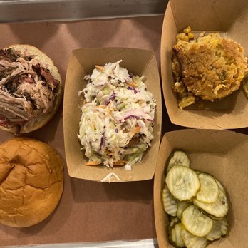 Caldwell County BBQ - Pulled pork sandwich with coleslaw, Aunt Susan's Corn Casserole, and pickles - Barbeque Near Me - Gilbert, Arizona