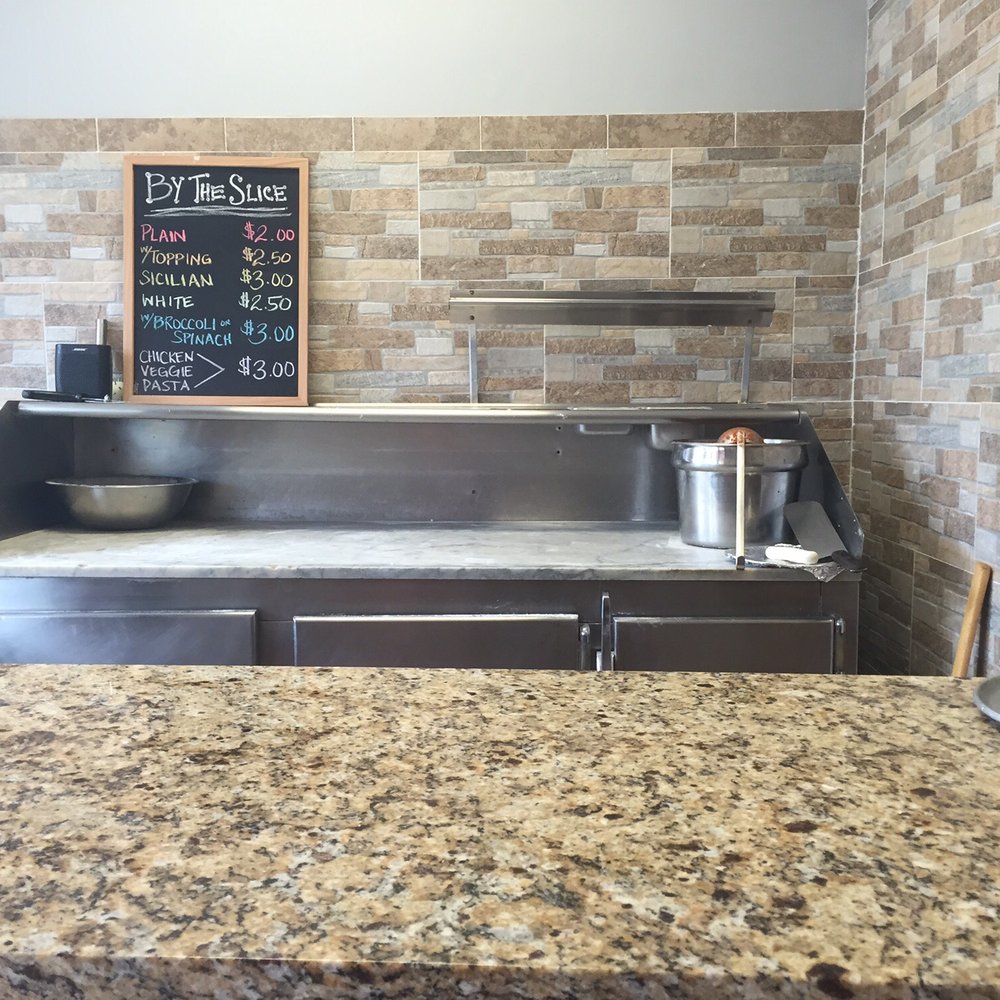 Paulie's Pizza & Wings - the kitchen counter - Chicken Wings Near Me - Tenafly, New Jersey