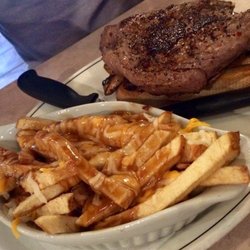 The Crossroads Restaurant and Pub - Steak & mushroom sandwich with poutine