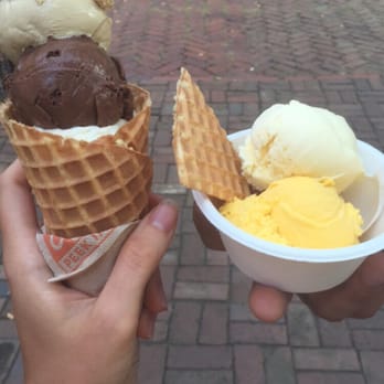 Jeni's Splendid Ice Creams - Salted caramel, darkest chocolate, and browned butter almond brittle in a waffle cone + mango lassi and passion fruit. - Ice Cream & Frozen Yogurt Near Me - Columbus, Ohio Jeni's Splendid Ice Creams - Salted caramel, darkest chocolate, and browned butter almond brittle in a waffle cone + mango lassi and passion fruit. - Ice Cream & Frozen Yogurt Near Me - Columbus, Ohio