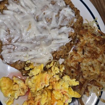 IHOP - Country Fried Steak, scrambled eggs with cheese and hash brown potatoes. - Breakfast & Brunch Near Me - Baltimore, Maryland IHOP - Country Fried Steak, scrambled eggs with cheese and hash brown potatoes. - Breakfast & Brunch Near Me - Baltimore, Maryland