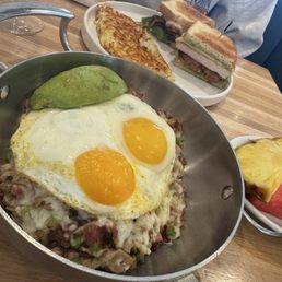 Chicken Avocado Sandwich add Bacon in the back and the Hog Bowl Hash Browns sunny side up eggs with avocado