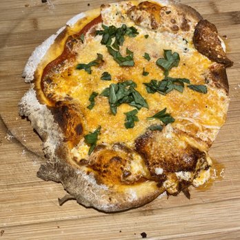 FRESH by Brookshire's - a pizza on a cutting board - Grocery Near Me - Tyler, Texas FRESH by Brookshire's - a pizza on a cutting board - Grocery Near Me - Tyler, Texas