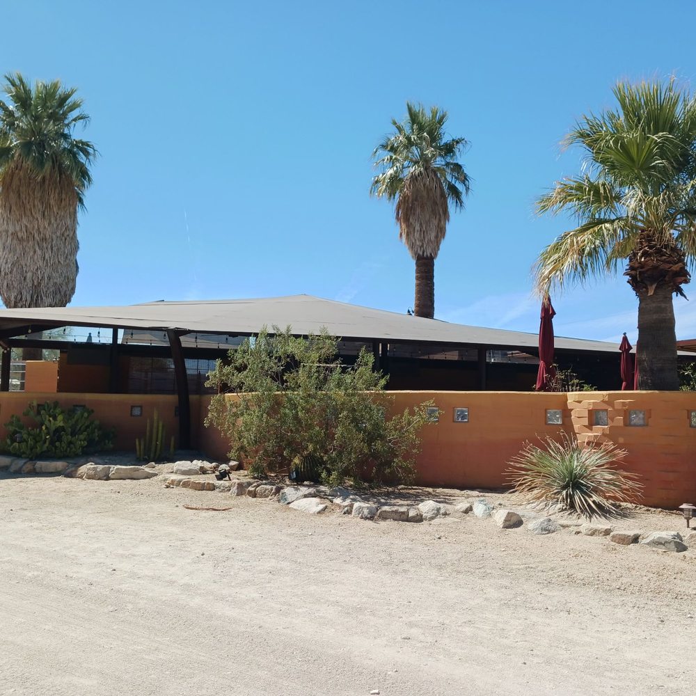 29 Palms Inn - Outdoor seating behind the barrier - New American Near Me - 29 Palms, California 29 Palms Inn - Outdoor seating behind the barrier - New American Near Me - 29 Palms, California