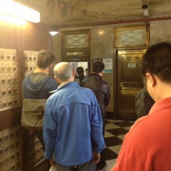US Post Office - Super long line to get a package - Post Offices Near Me - Flushing, New York