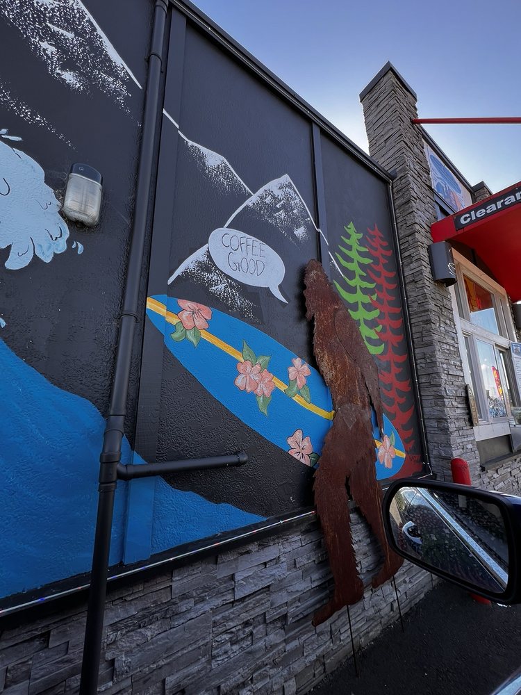 Surf Squatch Espresso & Grindz Logo