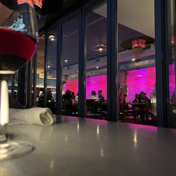 JRDN Restaurant - Outside looking in. I love that light wall! I'm sipping on a glass of Sean Minor pinot noir. - New American Near Me - San Diego, California JRDN Restaurant - Outside looking in. I love that light wall! I'm sipping on a glass of Sean Minor pinot noir. - New American Near Me - San Diego, California