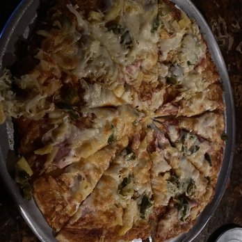 Moose's Saloon - Pineapple jalapeño Canadian bacon sour kraut - Pizza Near Me - Kalispell, Montana Moose's Saloon - Pineapple jalapeño Canadian bacon sour kraut - Pizza Near Me - Kalispell, Montana