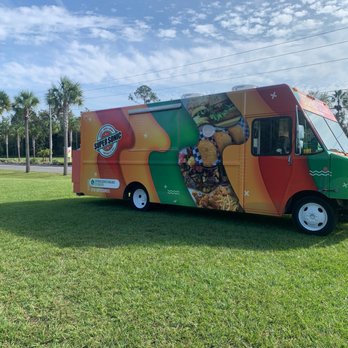 Supersonic - a colorful food truck parked in the grass - Food Trucks Near Me - Orlando, Florida Supersonic - a colorful food truck parked in the grass - Food Trucks Near Me - Orlando, Florida