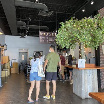 The Alley - a man and a woman standing in a coffee shop - Bubble Tea Near Me - Mississauga, Ontario The Alley - a man and a woman standing in a coffee shop - Bubble Tea Near Me - Mississauga, Ontario