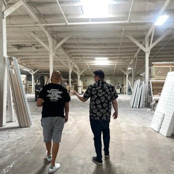 Arizona Shutter Company - Arizona Shutter Company team reviewing custom shutter production inside a manufacturing facility. - Shutters Near Me - Tempe, Arizona Arizona Shutter Company - Arizona Shutter Company team reviewing custom shutter production inside a manufacturing facility. - Shutters Near Me - Tempe, Arizona
