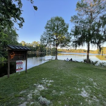Baughman Center - Side lake area - sign reads stay away from the water, notice people by the water lol - Venues & Event Spaces Near Me - Gainesville, Florida Baughman Center - Side lake area - sign reads stay away from the water, notice people by the water lol - Venues & Event Spaces Near Me - Gainesville, Florida