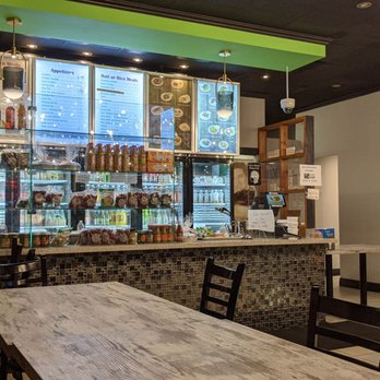 Lena's Roti & Doubles - Inside at one of the tables looking at the ordering counter. Oct 2022 - Caribbean Near Me - North York, Ontario Lena's Roti & Doubles - Inside at one of the tables looking at the ordering counter. Oct 2022 - Caribbean Near Me - North York, Ontario