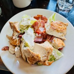 The Red Lion Pub - My wife had the wedge salad plus chicken ($20 as of 02/2024).  Recommended