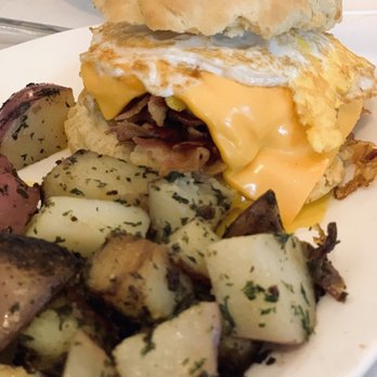 The Buttered Biscuit - Bacon, eggs and cheese on a biscuit with home fries. - New American Near Me - Bradley Beach, New Jersey The Buttered Biscuit - Bacon, eggs and cheese on a biscuit with home fries. - New American Near Me - Bradley Beach, New Jersey